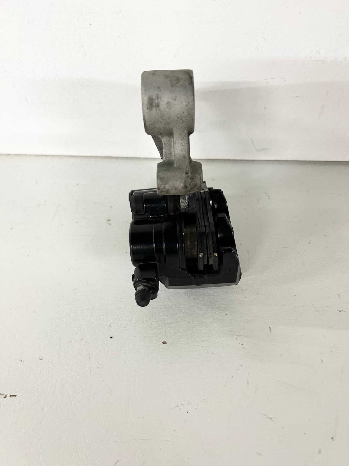 2013 2014 2015 2016 2017 Kawasaki Ninja 300 rear brake caliper with bracket (GM ID# 001517 )