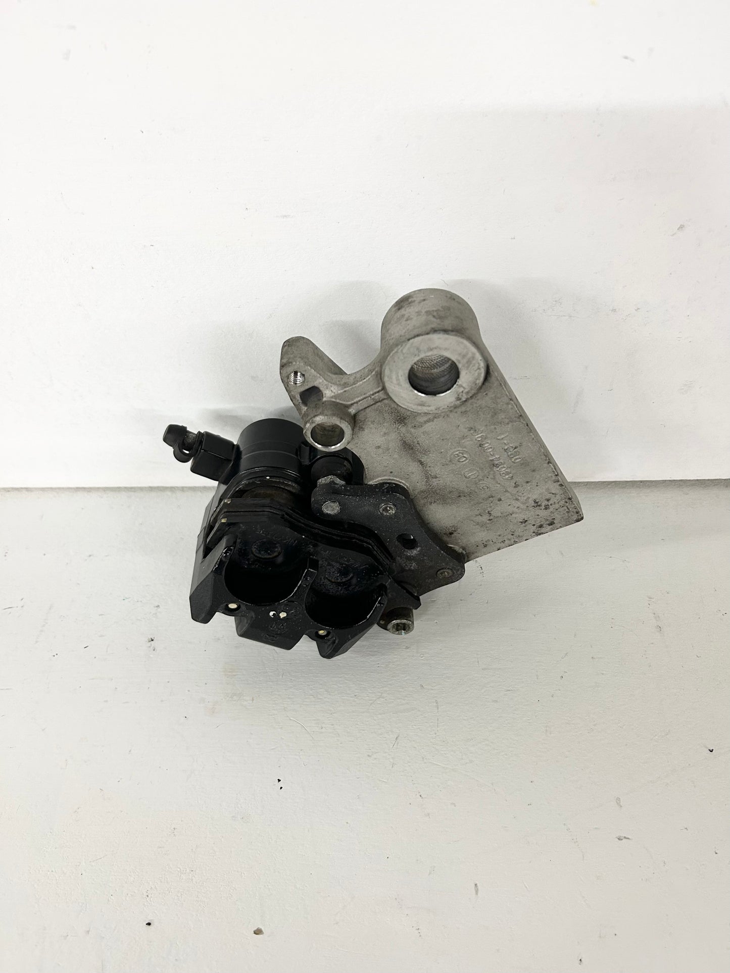 2013 2014 2015 2016 2017 Kawasaki Ninja 300 rear brake caliper with bracket (GM ID# 001517 )